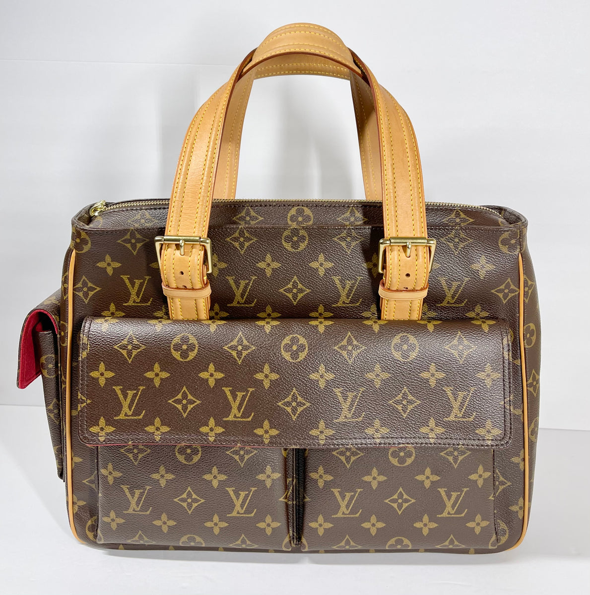 AUTHENTIC Louis Vuitton Multipli Cite Monogram PREOWNED (WBA1059) – Jj's  Closet, LLC