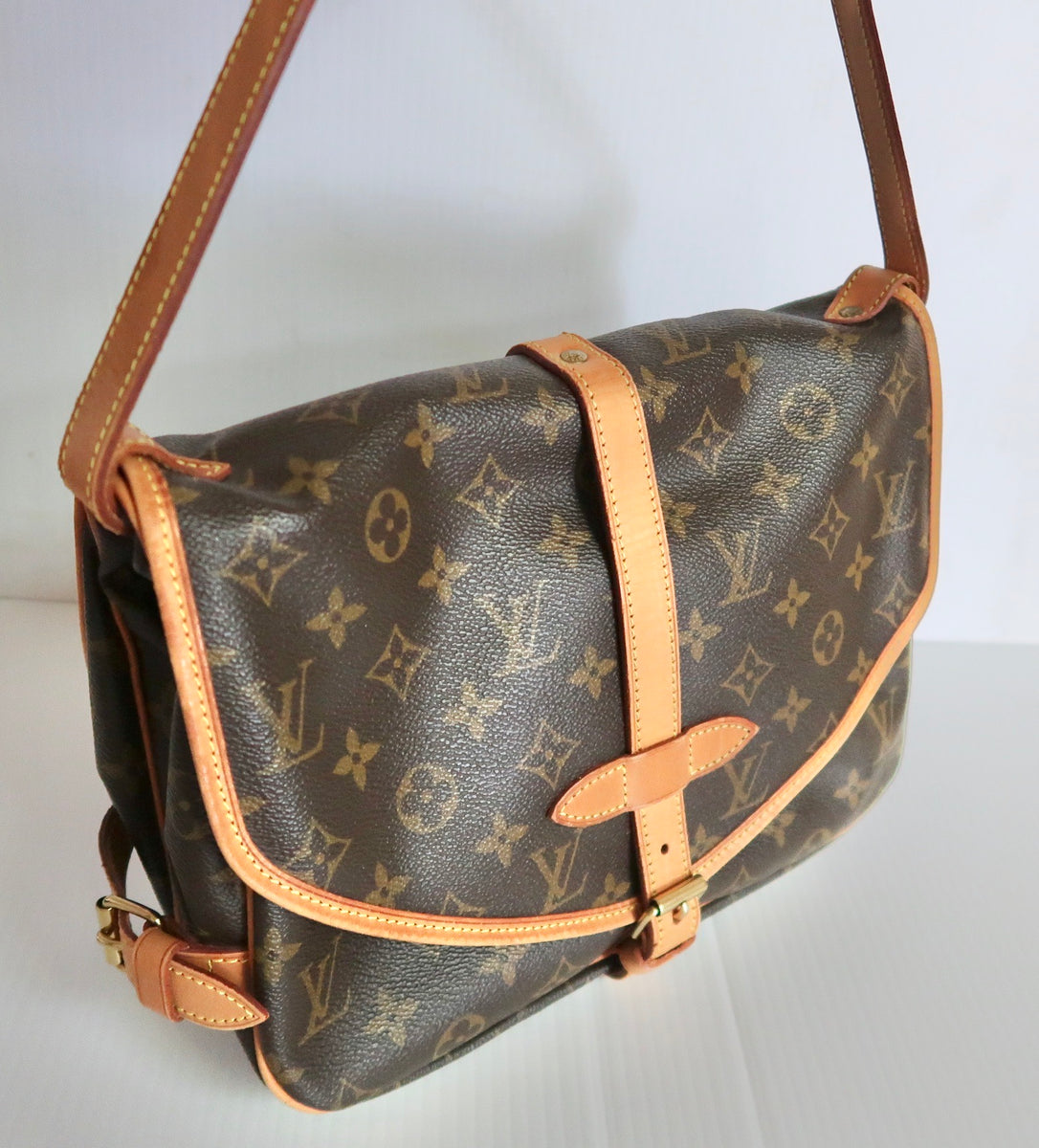 What Goes Around Comes Around Louis Vuitton Monogram Saumur 30 Bag  (Previously Owned), SHOP…