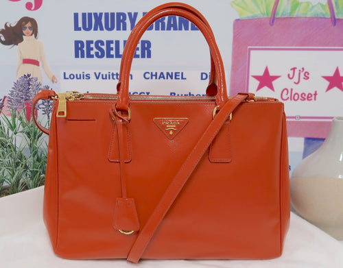 AUTHENTIC Prada Orange Saffiano PREOWNED (WBA117)