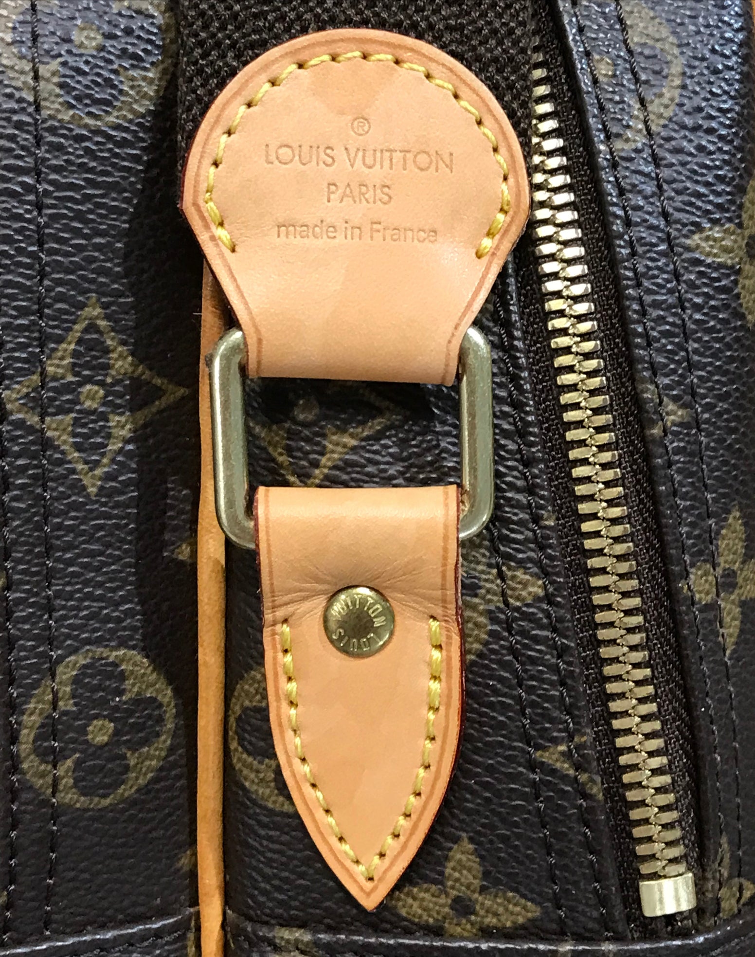 Louis Vuitton Monogram Reporter Gm, $795, TheRealReal
