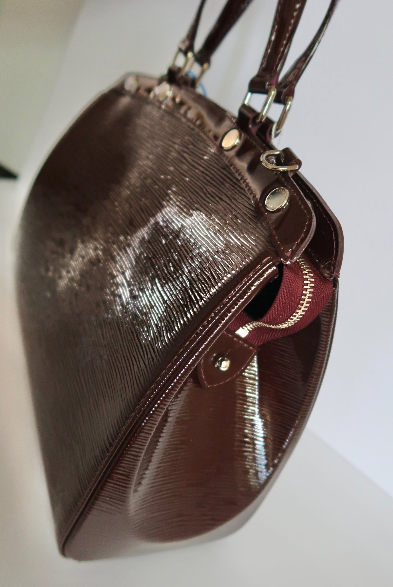 Louis Vuitton Prune Electric EPI Leather Brea mm Bag